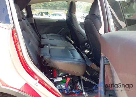 2023 Tesla Model Y Awd/Long Range Dual Motor All-Wheel Drive z USA, uszkodzony, nr VIN 7SAYGDEE6PA044624